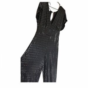 Premier Amour Black  Sparkle V-Neck Jumpsuit with Cinched Waist